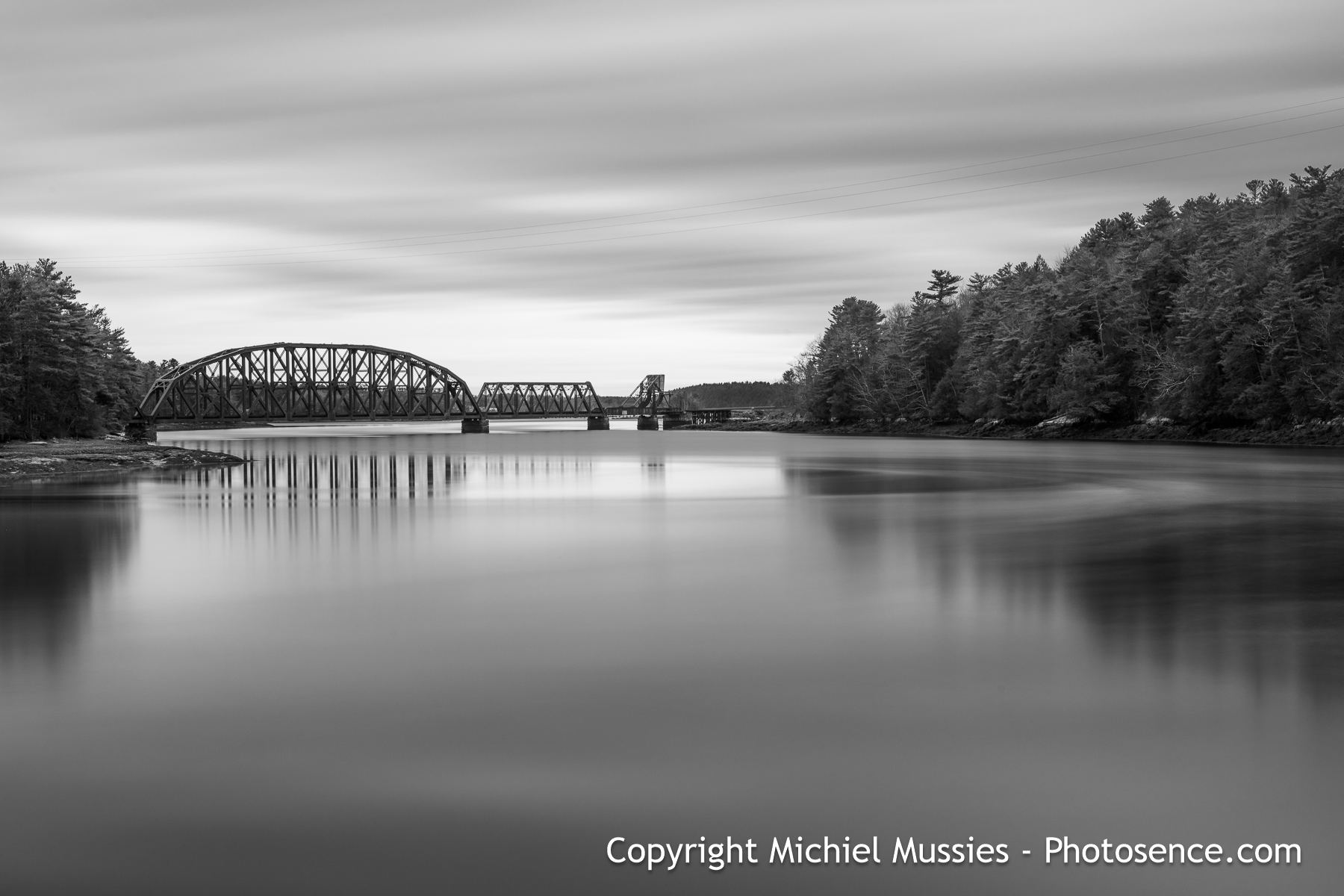 Monochrome print Wiscasset, Maine US. Long exposure, Decomissioned railroad bridge over